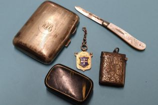 A silver vesta, gold fob cigarette case etc.