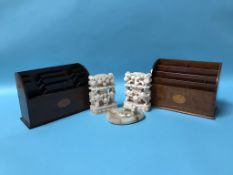 A pair of carved Oriental soapstone bookends, a cold cast dog, mounted on an onyx ashtray and two