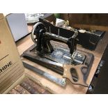 Hand crank sewing machine and a bone saw