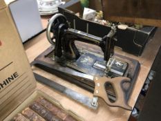 Hand crank sewing machine and a bone saw