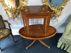 Yew wood nest of tables and oval coffee table