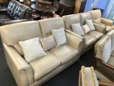 A Wade Additions armchair and two settees