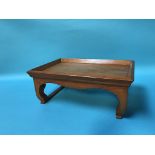 A small oriental wooden tray