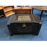 An oriental carved camphorwood chest