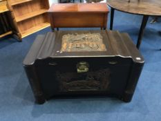 An oriental carved camphorwood chest