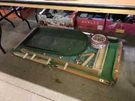 A mini snooker table etc.