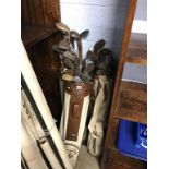 A collection of vintage golf clubs