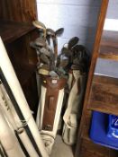 A collection of vintage golf clubs