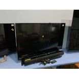 Bush TV, remote and sound bar