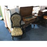 A campaign style desk, fire screen and a nursing chair