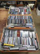 Three boxes of CD's / DVD's