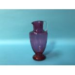 A Victorian cranberry water jug
