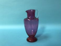 A Victorian cranberry water jug