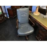 Blue leather swivel armchair