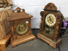 Two oak mantel clocks