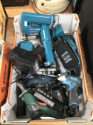 Box of Makita, Bosch and other drills