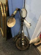 A Paragon solid brass bilge semi rotary pump and an industrial angle poise lamp