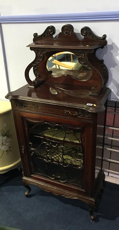 An Edwardian mahogany side cabinet