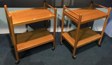 Pair of teak tea trolleys