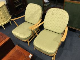 A pair of Ercol Golden Dawn armchairs