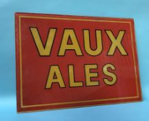 A pair of glass Vaux Ales advertising signs, 45cm x 62cm