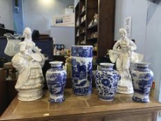 Quantity of blue and white modern china and a pair of figures