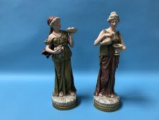 A pair of Royal Dux female figures, 38cm high