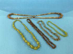 Box of amber coloured beads