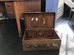 A leather fitted vanity case