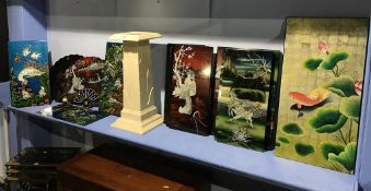 A large collection of decorative Oriental panel sets and a cream pedestal