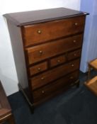 Stag chest of drawers