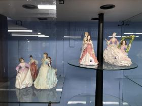 Eight Royal Doulton figurines