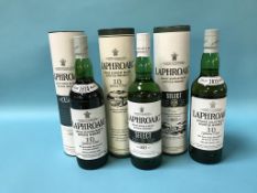 Three bottles of Laphroaig 10 year old Scotch whisky