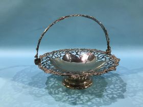 A Victorian pierced silver basket, with swing handle, London, weight 23oz