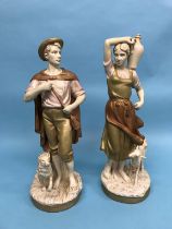 A tall pair of Royal Dux figures of a Shepherd and Shepherdess, 56cm high