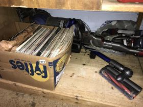 Dyson hoover and a box of records