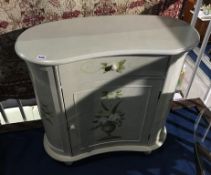A painted side cabinet