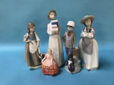 Four Nao figures and a Royal Doulton figure