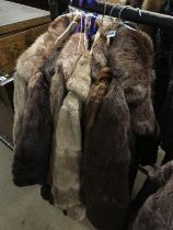 Eight fur coats