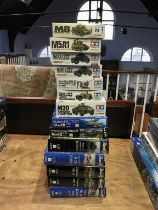 Seven Revell and seven various Tamiya model kits