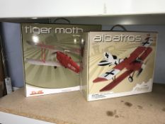 Two boxed model planes
