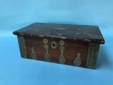 A 19th Century 'Moorish' brass bound box opening, to reveal a fitted interior, W 45cm