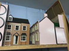 Two dolls houses