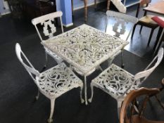 Metalwork garden table and four chairs