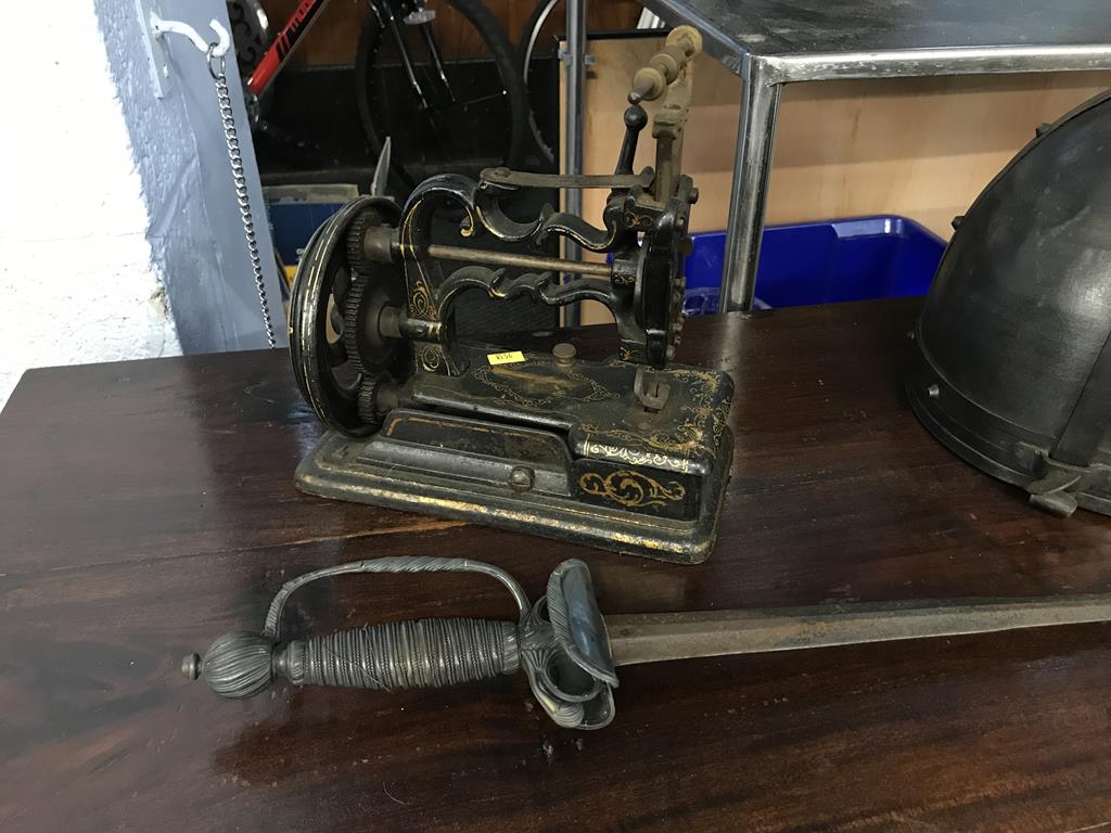 An F. Franx of Liverpool sewing machine, a sword and replica helmet - Image 2 of 4