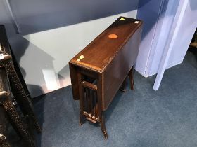 An Edwardian mahogany Sutherland table