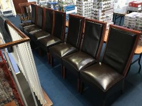 Seven dining chairs
