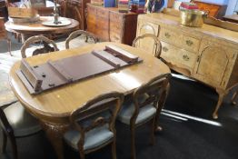 Walnut sideboard, dining table and a set of six Victorian walnut chairs