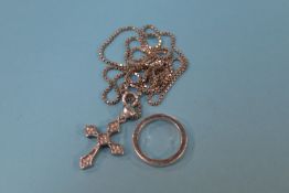 A silver ring and pendant