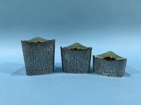 Set of three Asprey silver candle holders, London, 1970, 284g, with original receipt